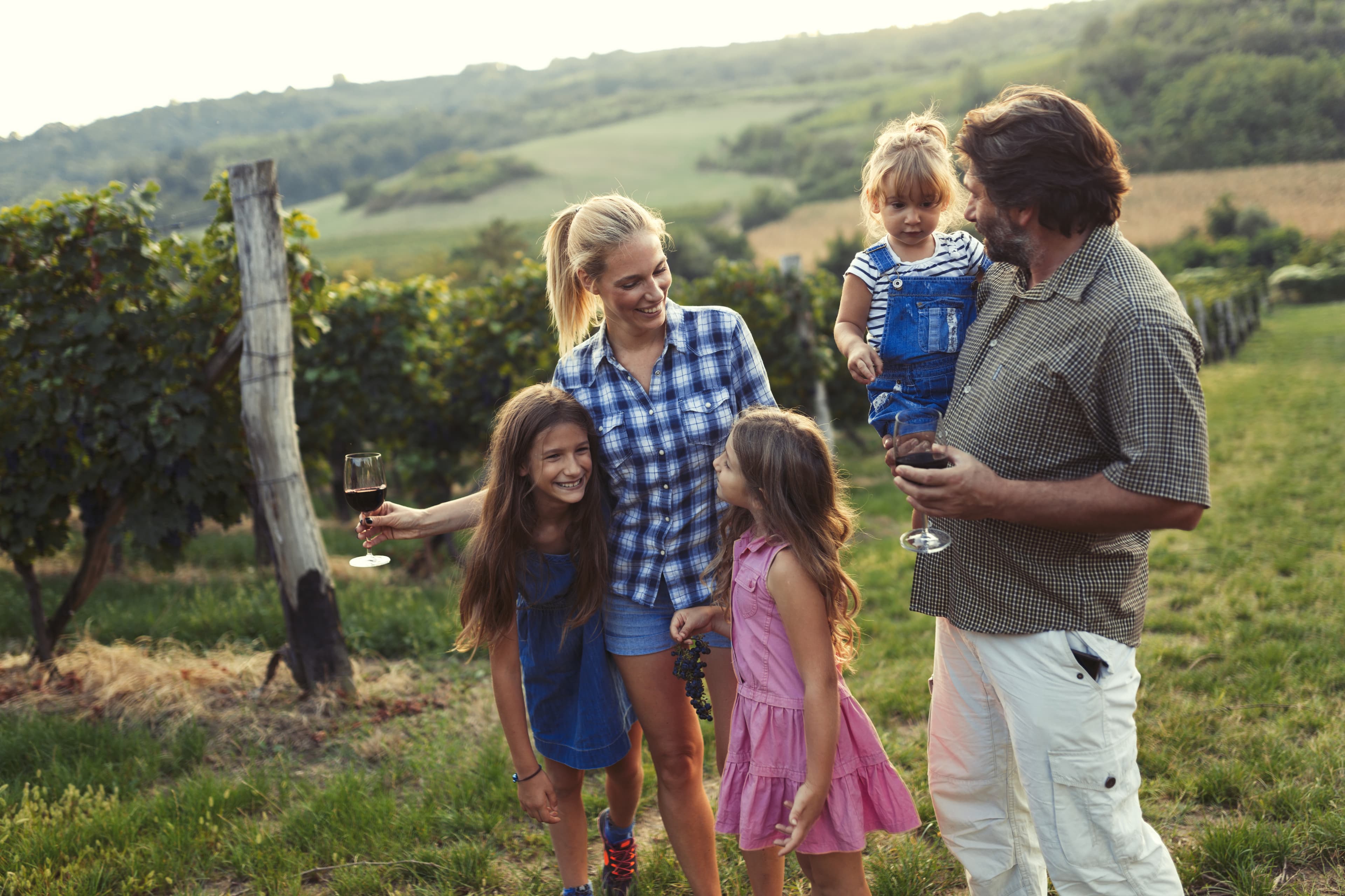 A family together among vineyard rows at Riversdale Estate